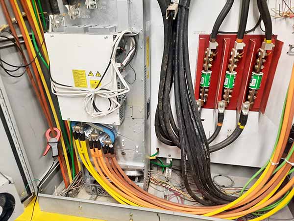 Figure 1: While a small common-mode choke is installed, note the loose conductors and interspersed ground leads.