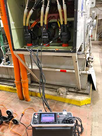 High voltage testing at 4000 hp motor connection box.