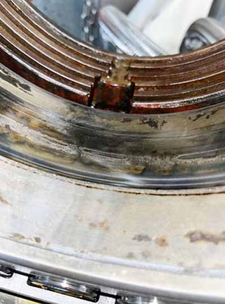 Visible wear marks on both the bearing ring and shaft surface